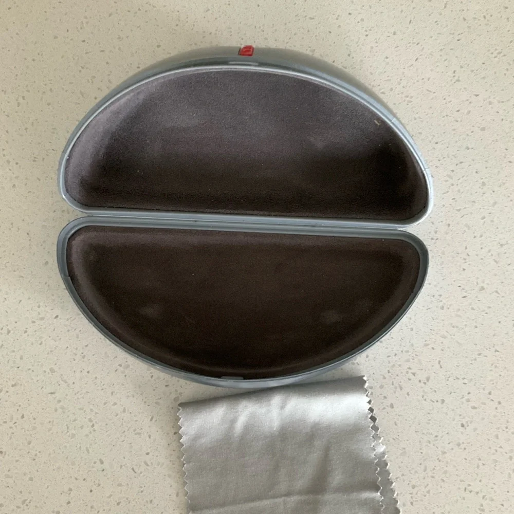Prada Silver sunglasses case